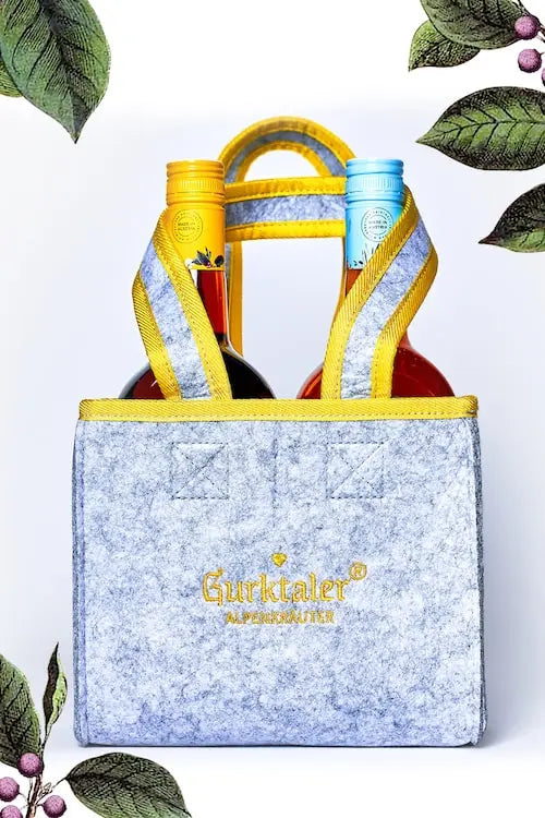 Gurktaler Doppelpack in Filztasche: 1x Gurktaler Alpen-Aperitif 0,7l 16% vol, 1x Gurktaler der Milde Alpenkräuter 0,7l 27% vol.